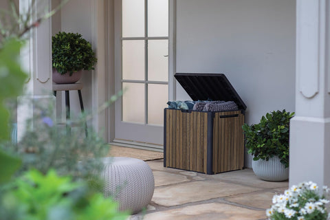 Keter Signature Everwood box storing pool floats neatly after use