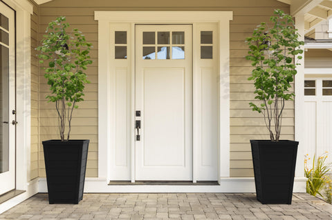 Keter wood-look tapered planter graphite garden border accents.