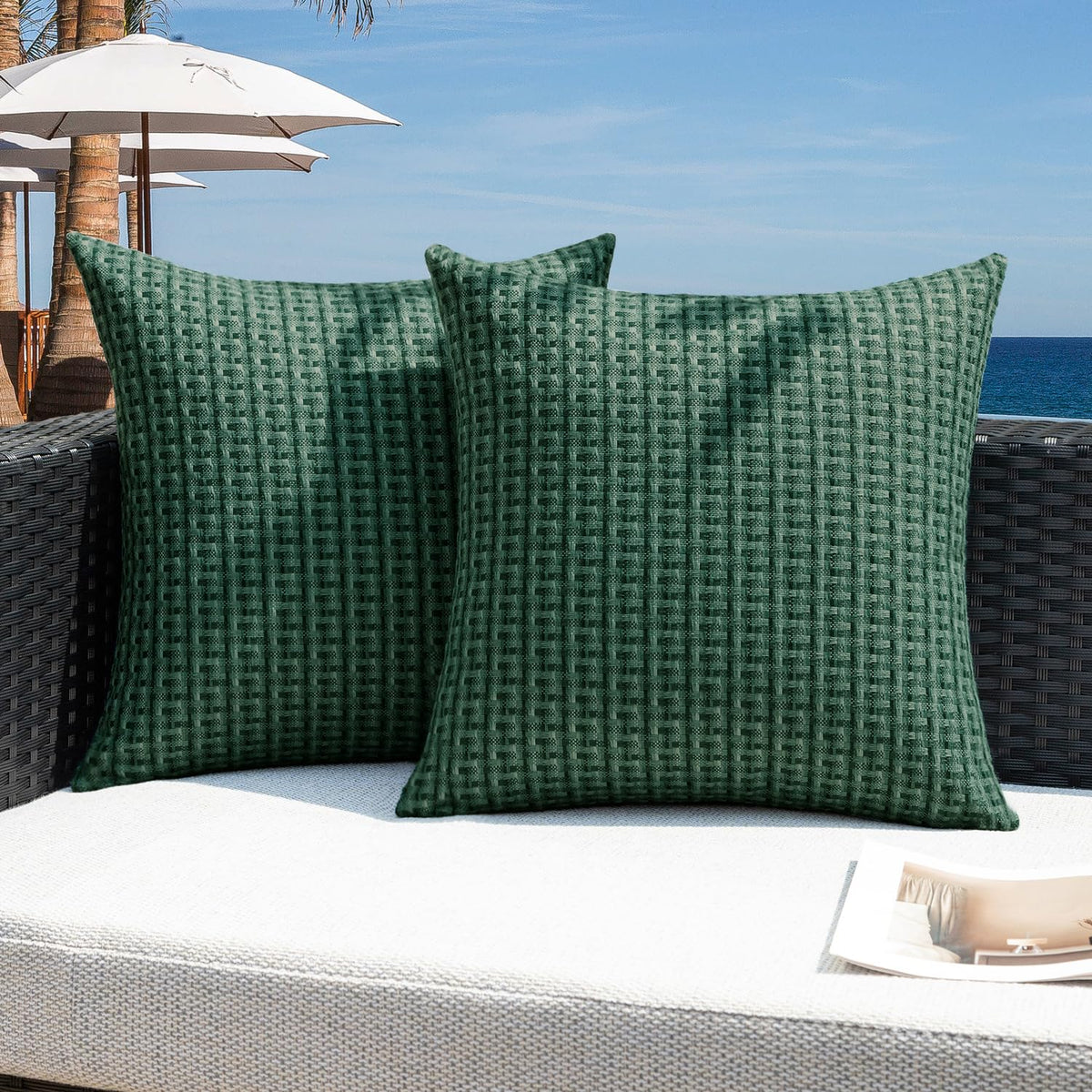 Kevin Textile dark green outdoor pillow cover with waterproof coating for rain-ready patio decor.