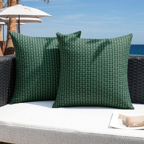 Kevin Textile dark green outdoor pillow cover with waterproof coating for rain-ready patio decor.