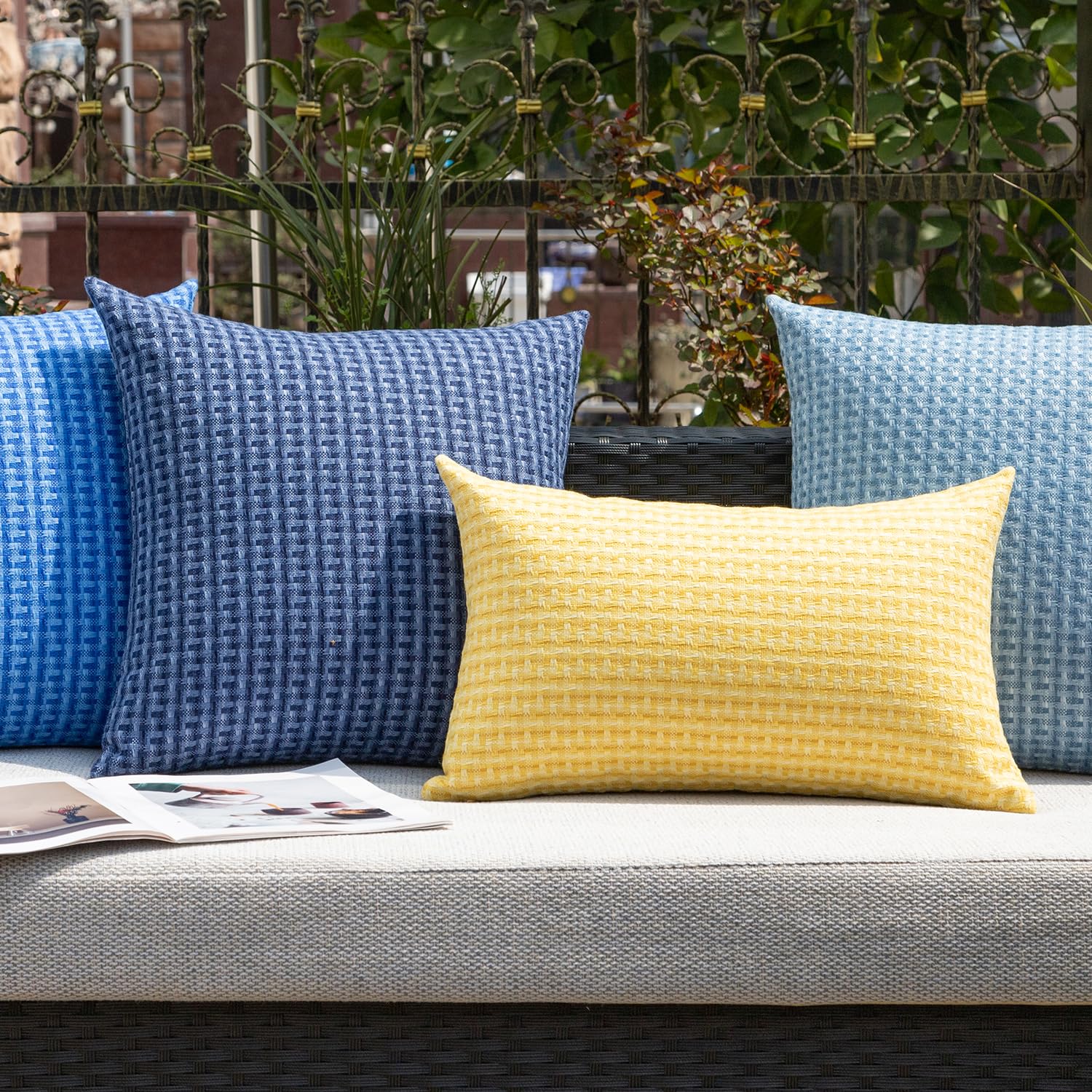 Kevin Textile machine washable navy cover simplifies outdoor care.
