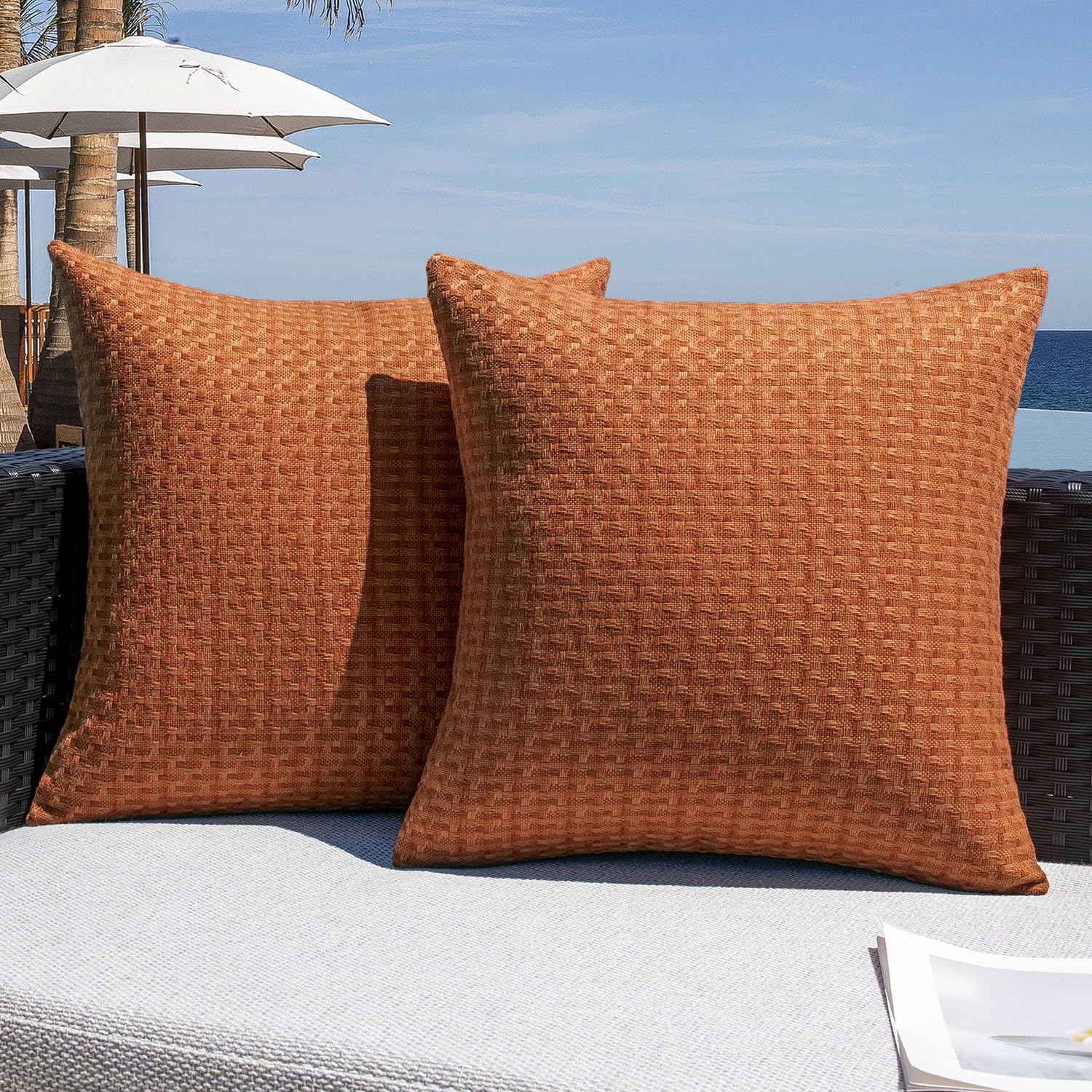 Kevin Textile outdoor pillow cover in burnt orange, 18x18, ideal for garden seating.