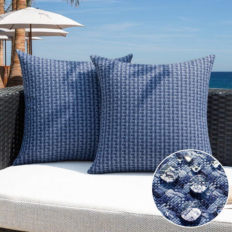 Kevin Textile outdoor waterproof navy pillow cover protects cushions from splashes.