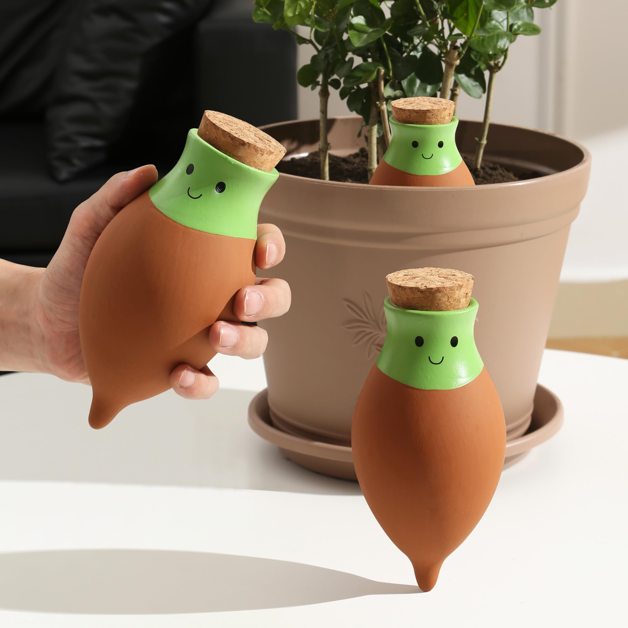 KGCCIZI Ollas water globes in a large pot delivering slow, even moisture