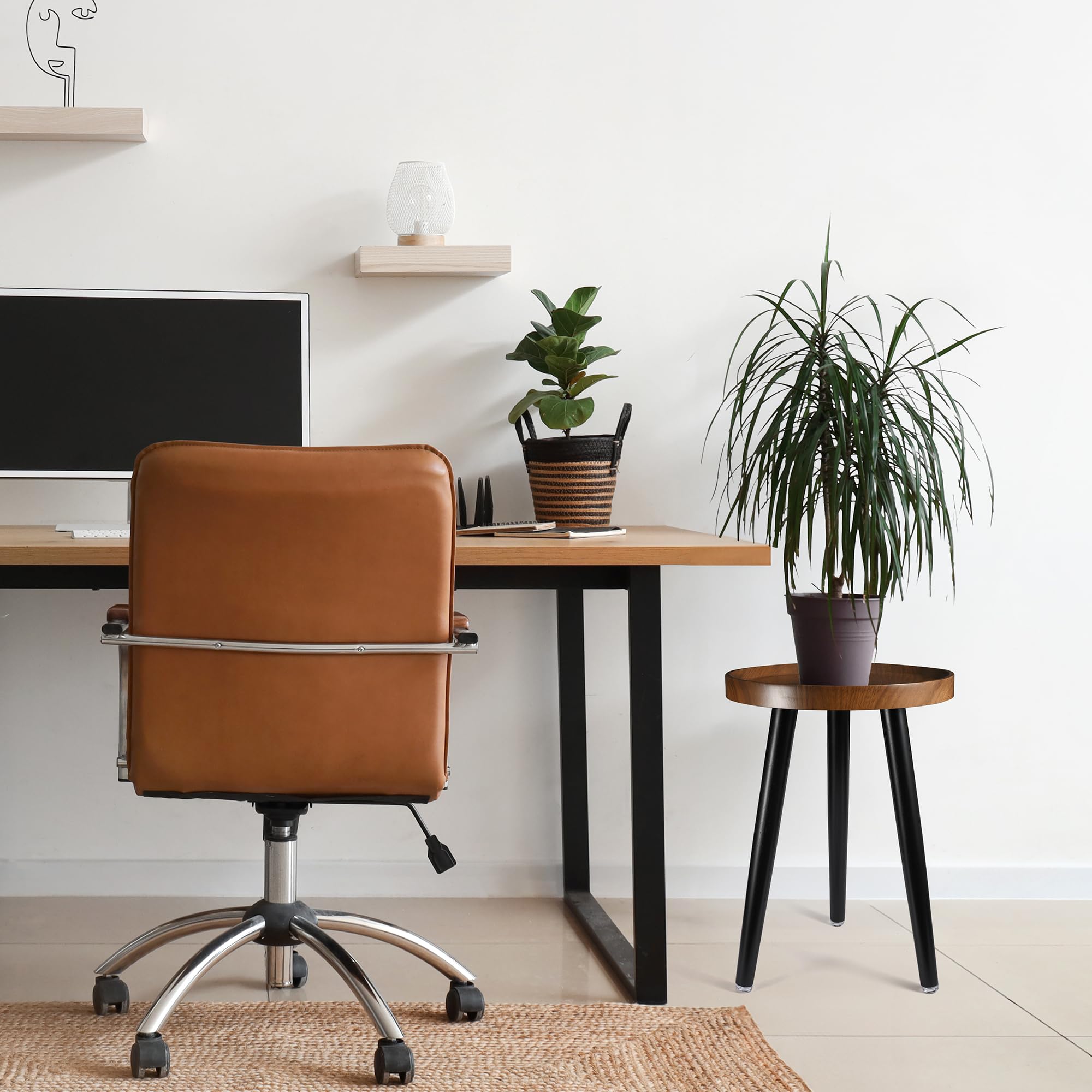 KGPLOME walnut round plant stand can serve as a compact bedside table.