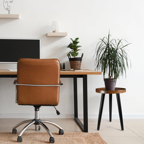 KGPLOME walnut round plant stand can serve as a compact bedside table.