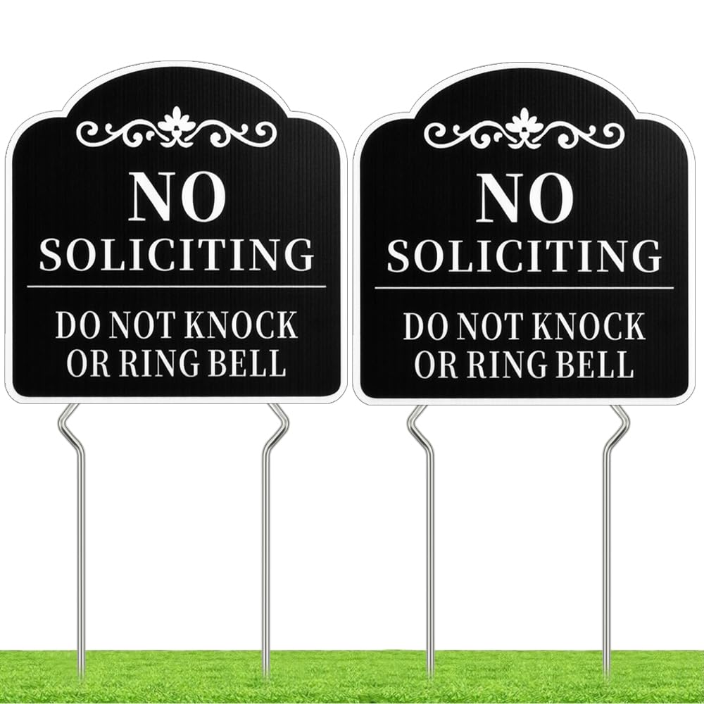 Kichwit no-soliciting sign in front yard, double-sided for clear visibility.
