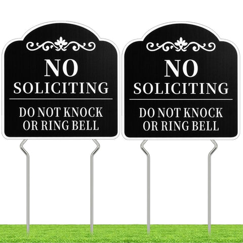 Kichwit no-soliciting sign in front yard, double-sided for clear visibility.