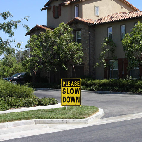 Kichwit Please Slow Down Sign with stakes ready for installation
