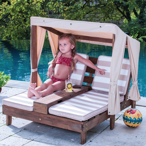 KidKraft lounge with cup holders close up for drinks and snacks outdoors