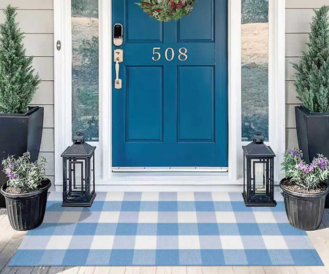 KIhipIoe buffalo plaid rug enhances Nordic or modern decor with a timeless pattern.