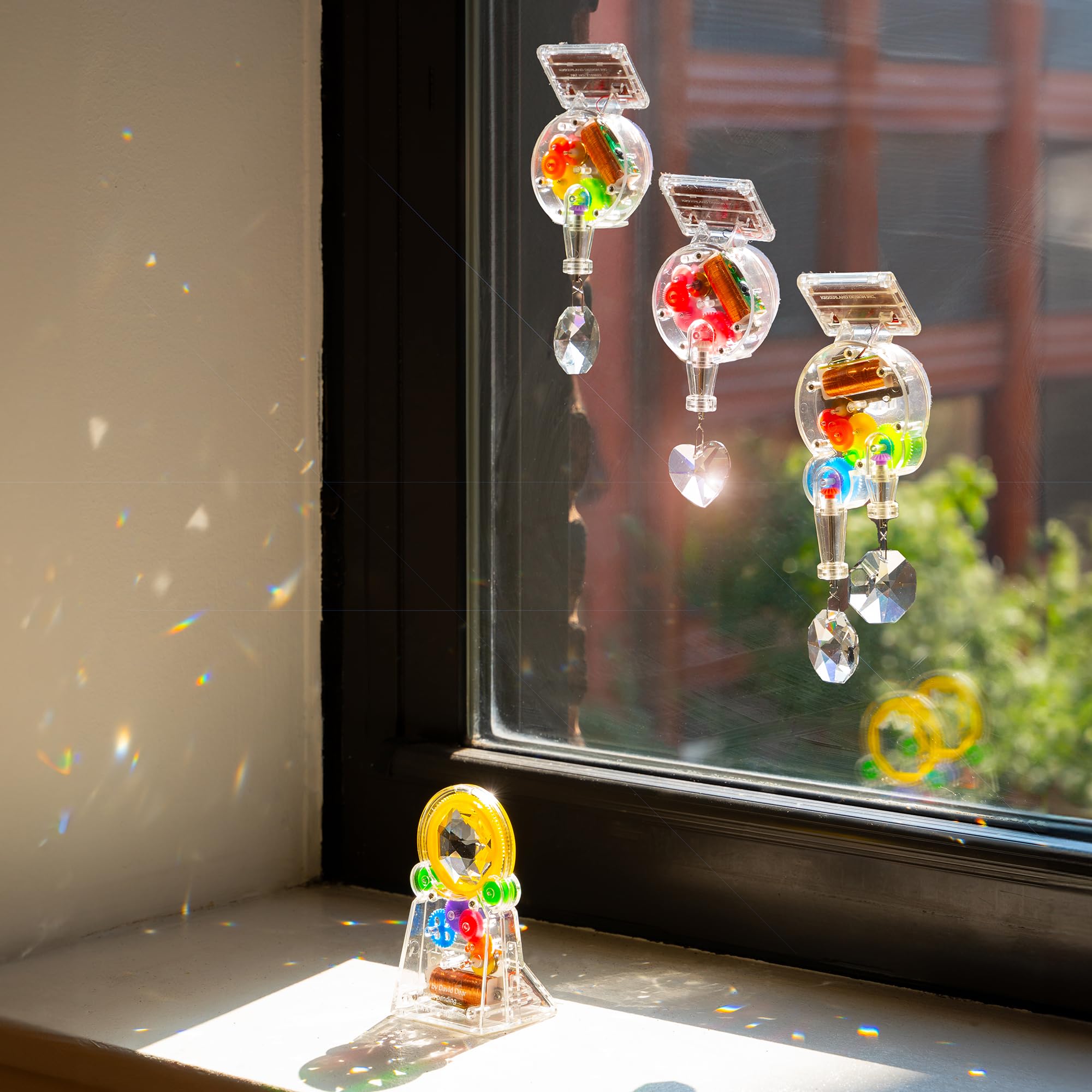 Heart-shaped suncatcher from Kikkerland adds playful charm to windows.