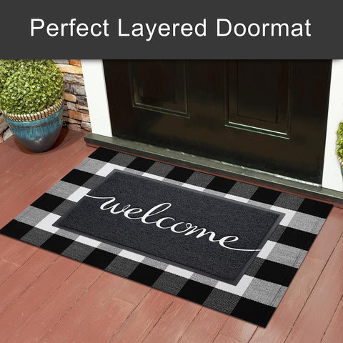 KILOCOCO Embossed dirt-trap mat catches sand, snow, and mud at the doorway.