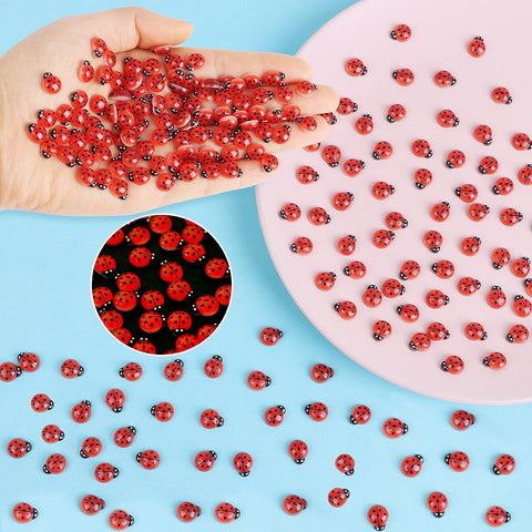 Kimober glow-in-dark ladybug figure 100-pack for fairy garden accents.