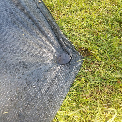 KINGLAKE weed cover stake stabilizes landscape fabric.