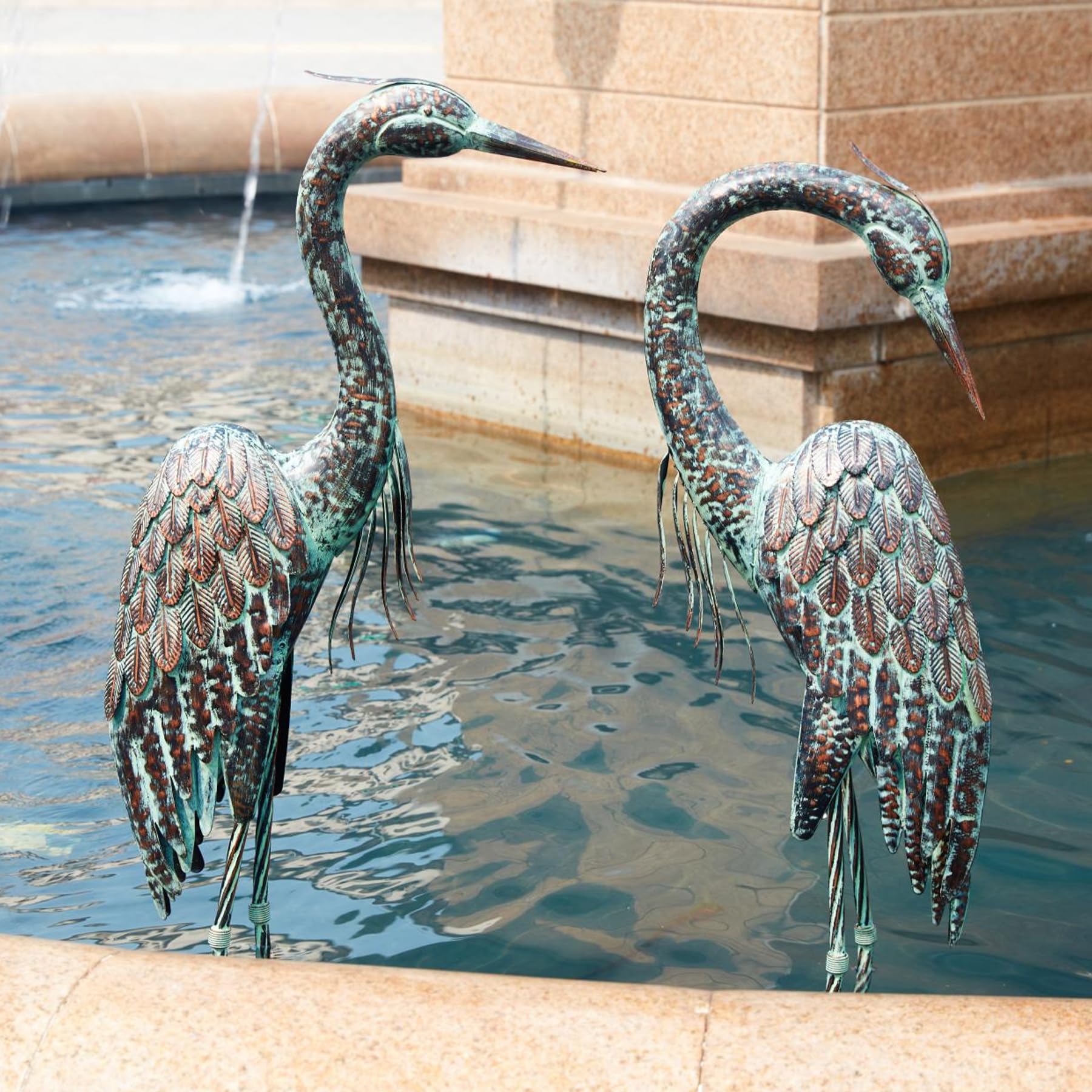 Kircust crane statue with thick legs remains securely anchored.