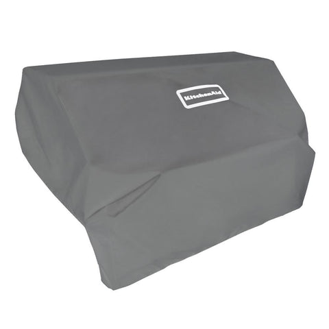KitchenAid grill cover with elastic band secures the island head for outdoor use.