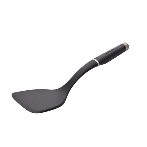 KitchenAid Gourmet Large Solid Turner head close-up showing reinforced nylon durability.