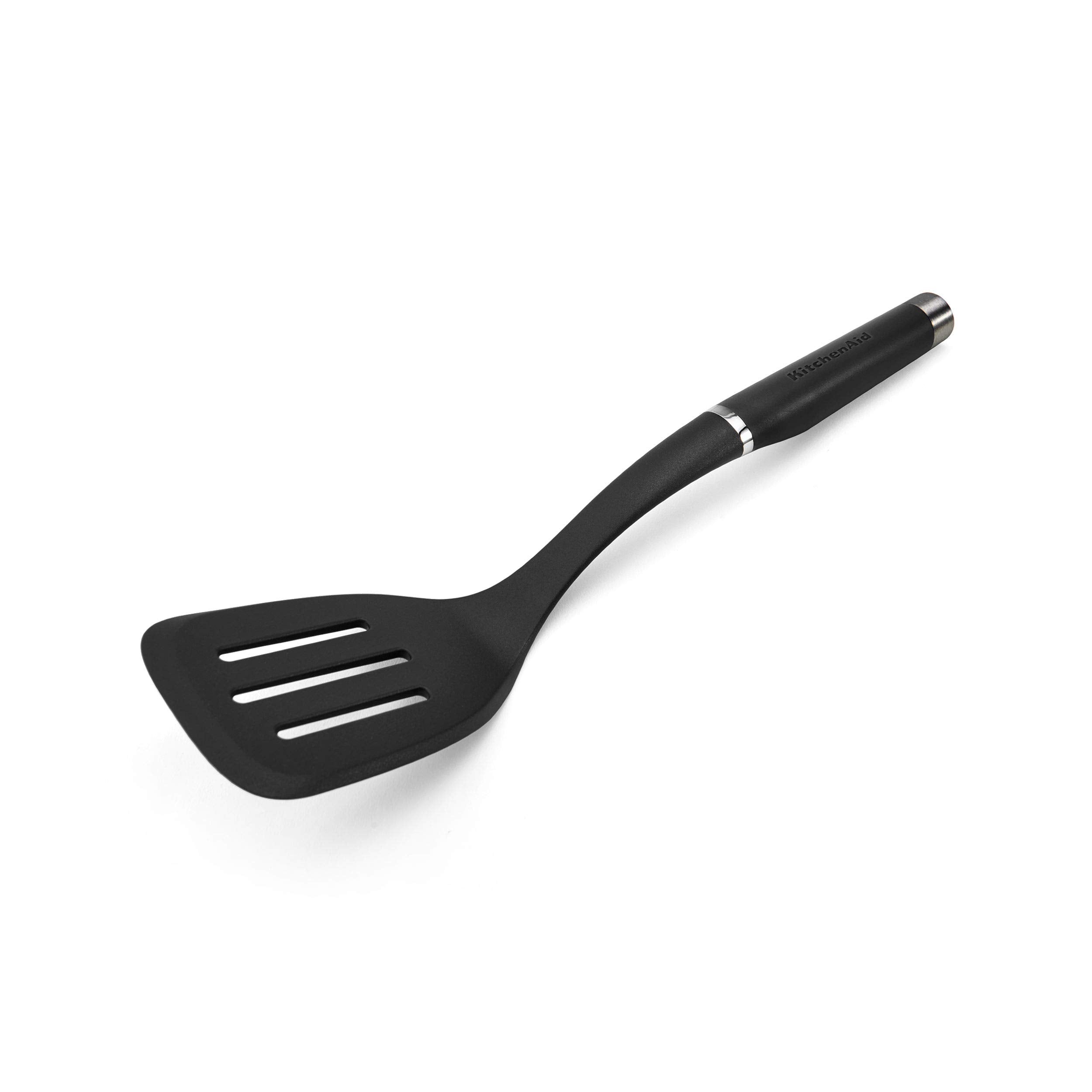 KitchenAid gourmet nylon slotted turner in black showing a wide turning surface for lifting foods safely.
