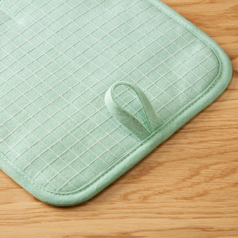 KitchenAid gridlines pot holder with thick padding cushions hands during high-heat tasks.