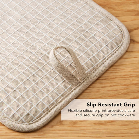 KitchenAid Gridlines pot holders with hanging loop for tidy storage.