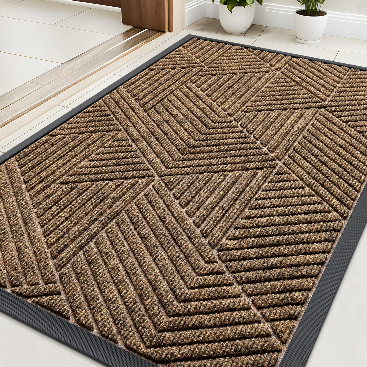 Kitinjoy front door mat traps moisture and dirt to keep entry clean.