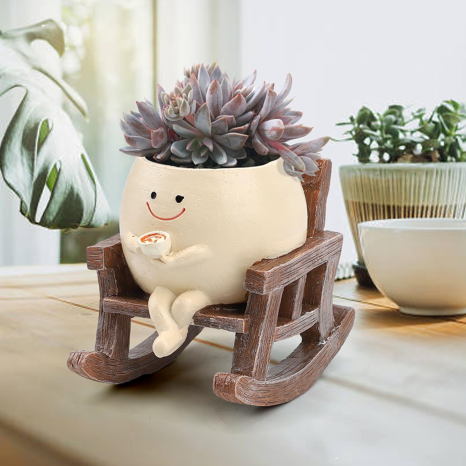 KIUGCO Smily Face Planter on a patio or balcony for outdoor decor