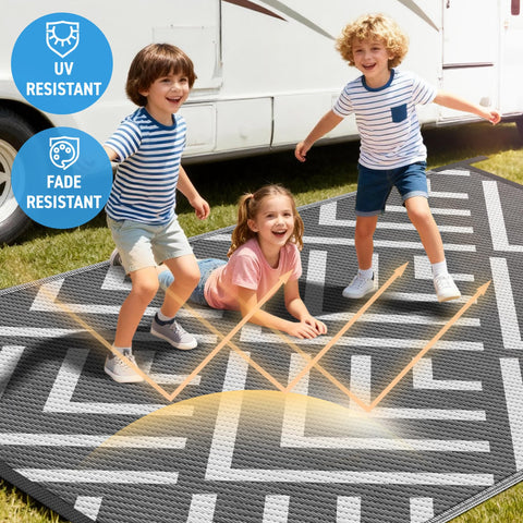Kohree rug with corner loops and stakes keeps it stable in windy settings.