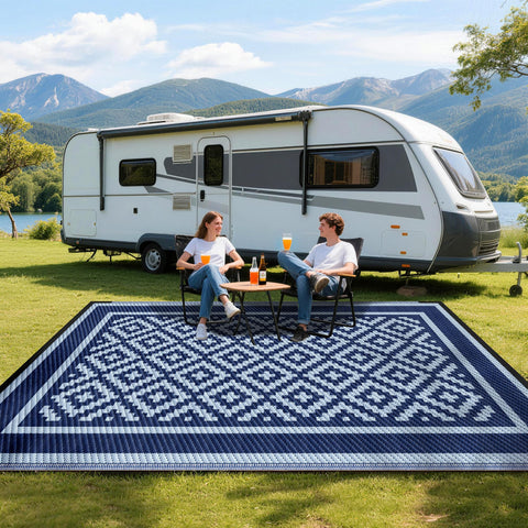 Kohree blue outdoor rug stays in place with corner loops and heavy stakes.