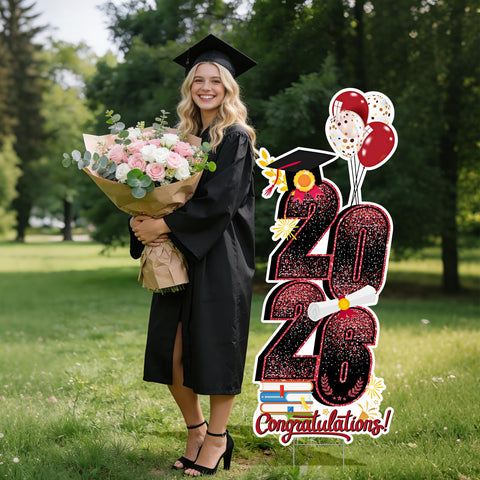 KOITHE 2026 grad yard sign doubles as a photo backdrop prop.