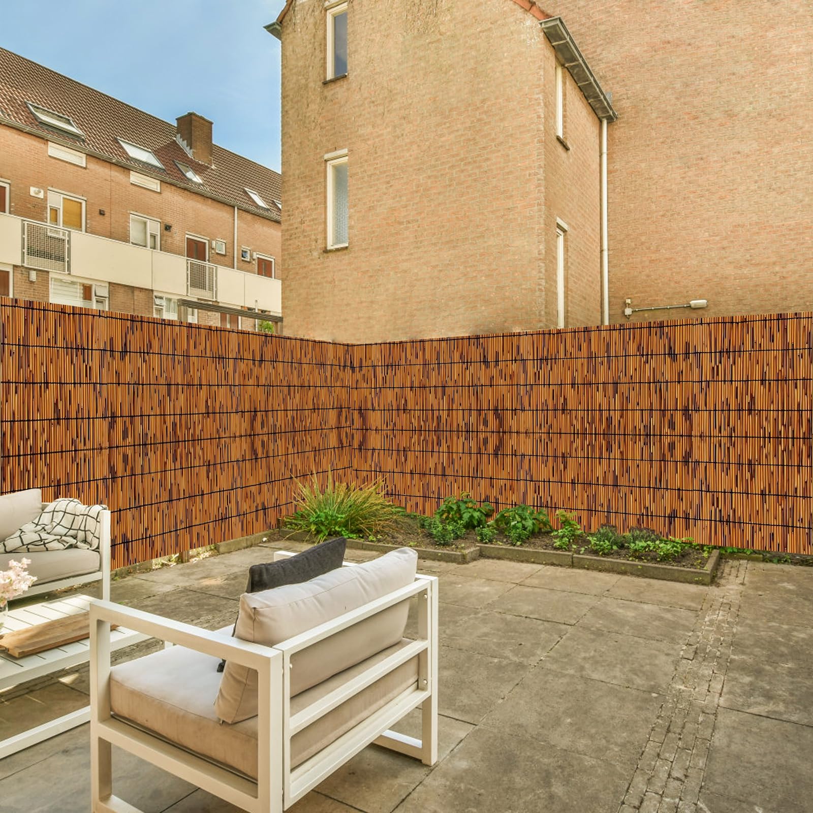 KOIUEYW natural reed fence art adds rustic garden charm.