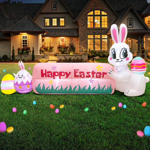 Kooy blow-up yard decor with banner and lights boosts curb appeal at night