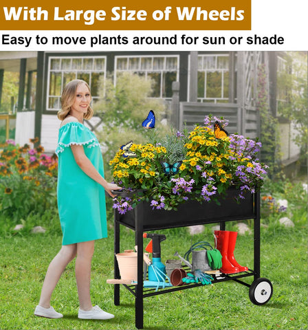 Koutemie raised planter bed with legs for stable elevated gardening in a small space.