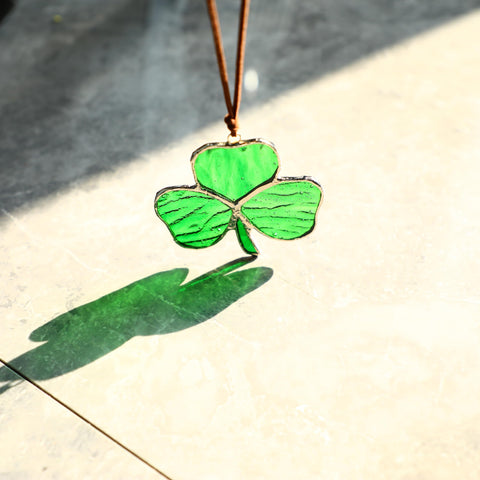 KRISININE gift-ready shamrock suncatcher in a decorative box.