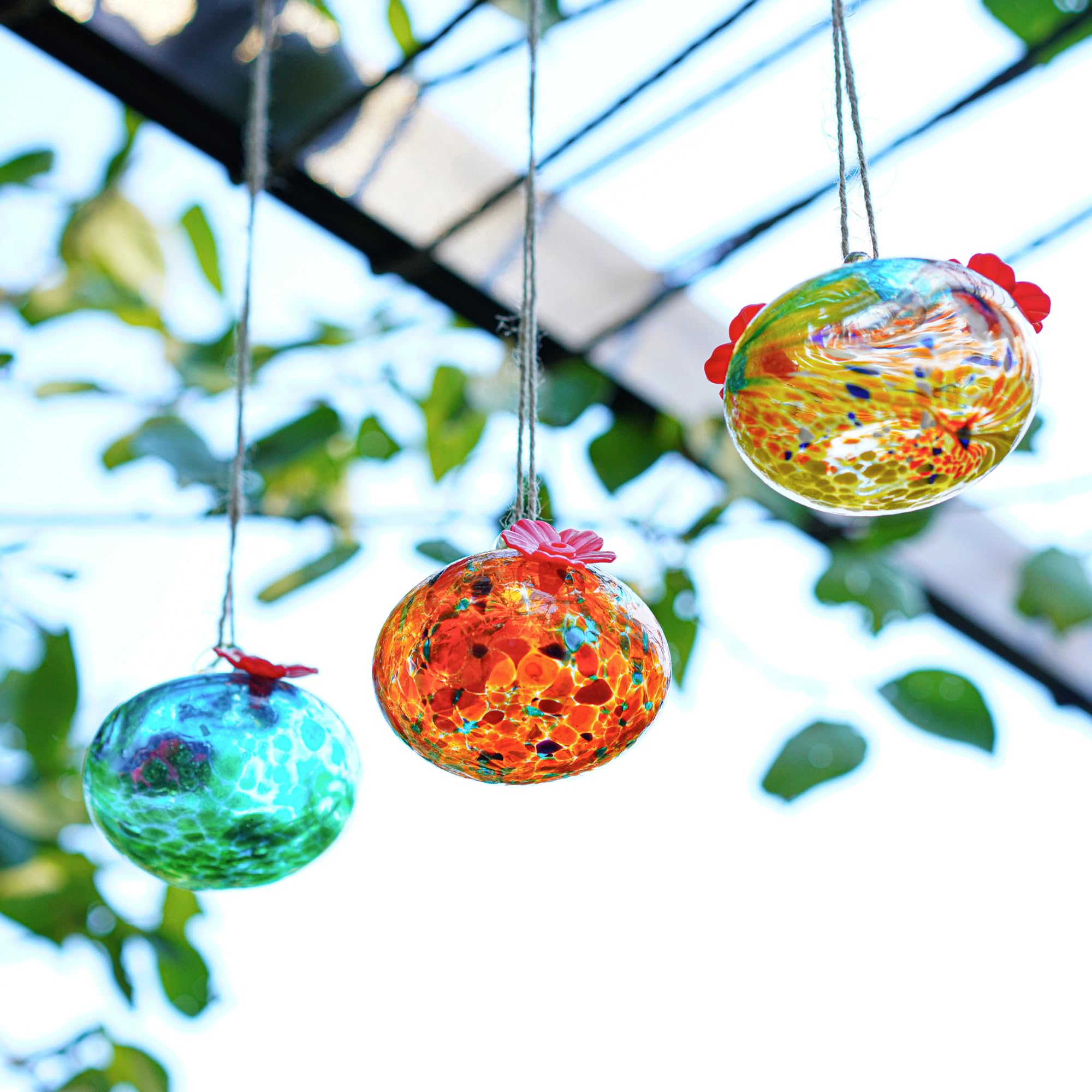 KRISININE 3.3 oz nectar capacity glass feeder ready for backyard visits.