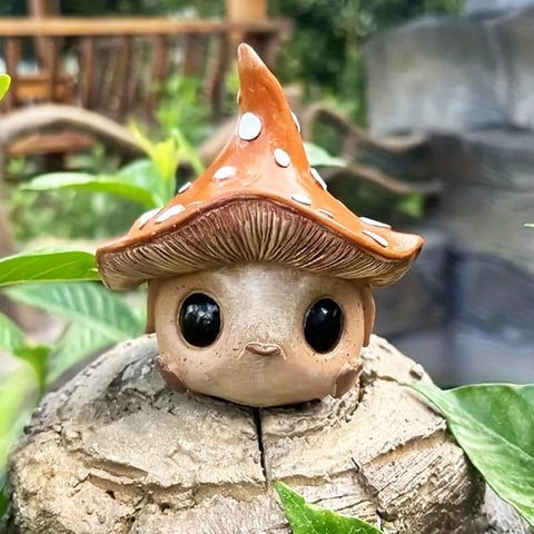 Kudriod mushroom-alien garden statue adds whimsical charm to outdoor spaces.