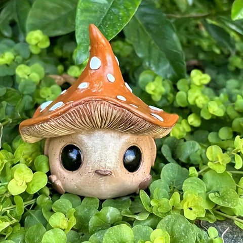 Kudriod outdoor gnome statue with mushroom theme enhances garden pathways.