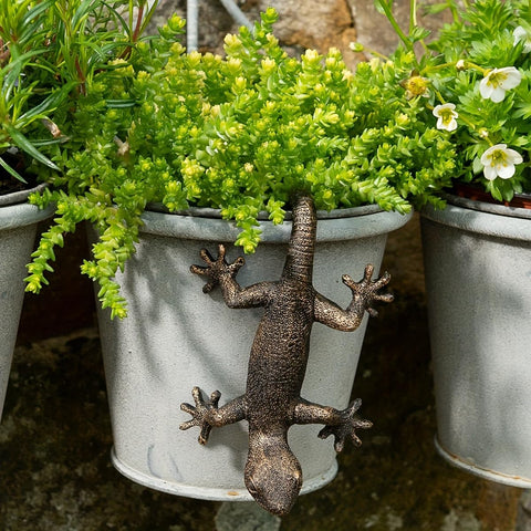 Kudriod resin gecko garden decor withstands outdoor weather for year round charm.