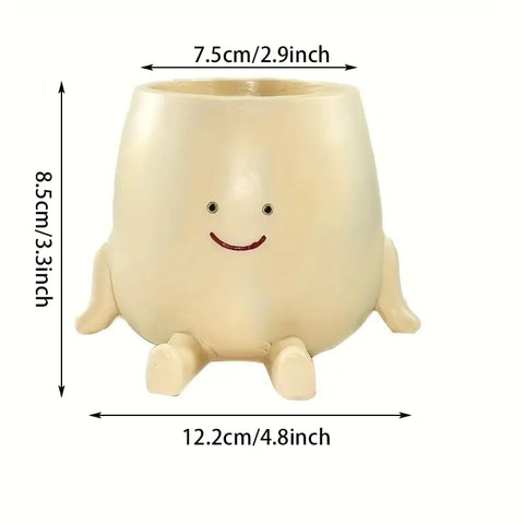 Kudriod Smiley Face Planter on a desk adds playful charm to home or office