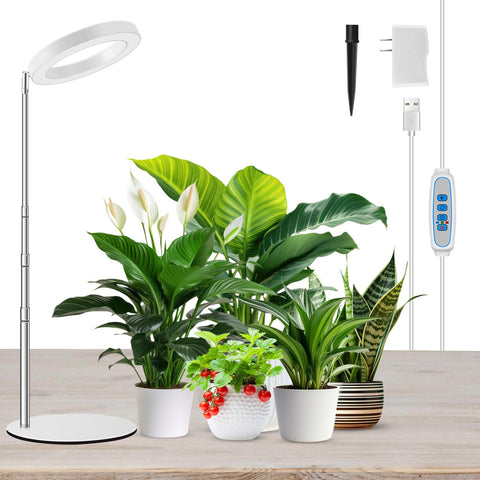 Kullsinss grow light with full-spectrum 80 LEDs over vibrant indoor greens.