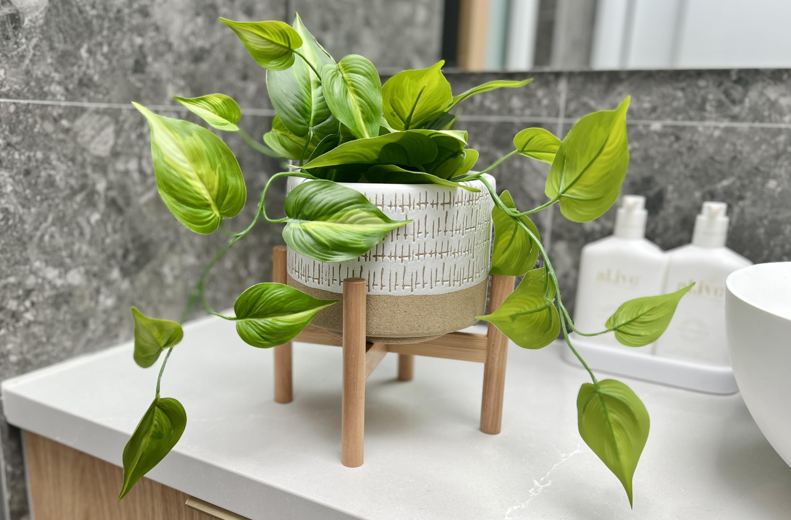 Kurrajong Farmhouse planter with bamboo stand complements a bathroom decor setup.