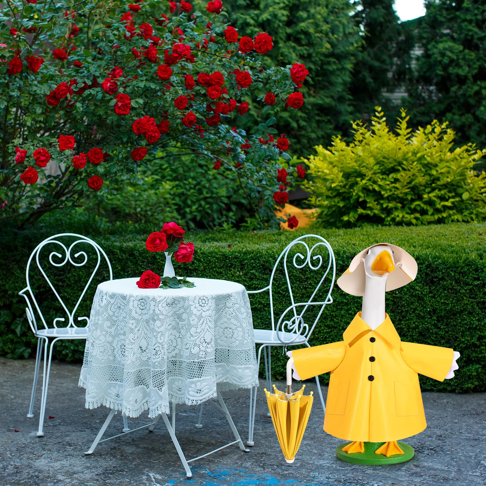 Kuscul outdoor goose decor idea with bright yellow outfit.