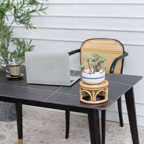 KUTORKILL boho rattan round riser stand side view natural texture
