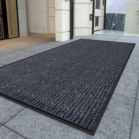 Kuyal mat with non-slip backing prevents slips at thresholds