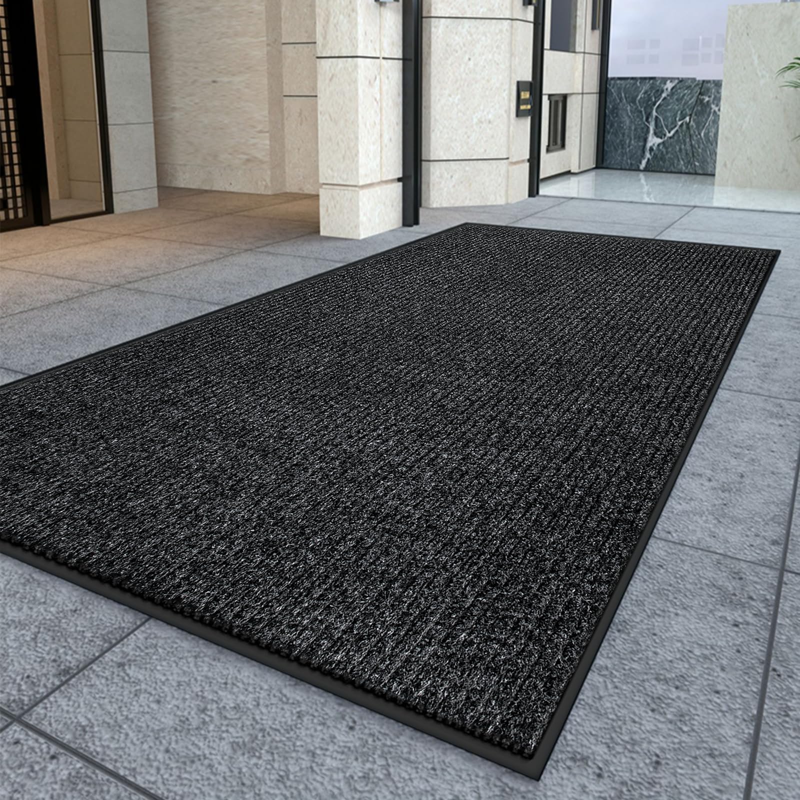 Kuyal mat with textured backing demonstrates non-slip stability for indoor/outdoor entrances.