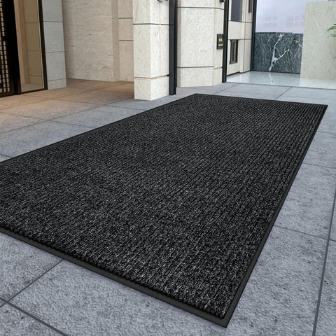 Kuyal mat with textured backing demonstrates non-slip stability for indoor/outdoor entrances.