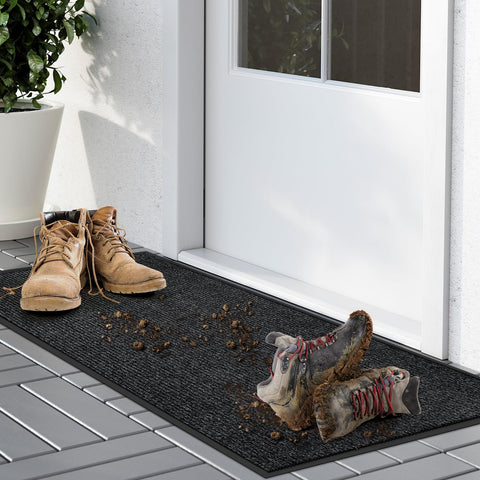 Kuyal indoor-outdoor entrance mat non-slip backing stays secure in high traffic