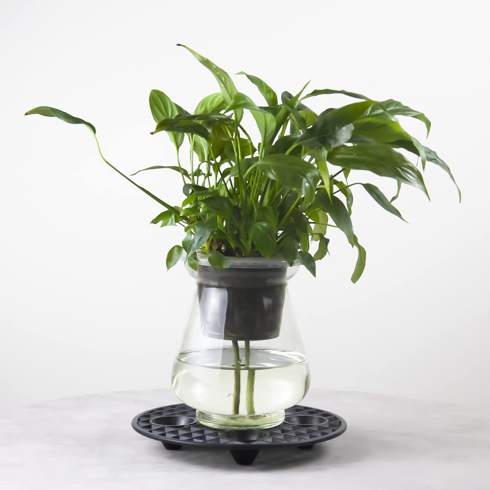 KVMORZE plant saucer riser provides indoor outdoor drainage under pots.