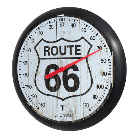 La Crosse Route 66 thermometer in garden demonstrates weather-resistant outdoor use.