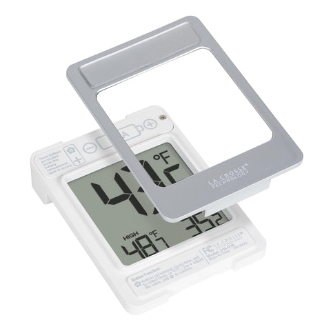 La Crosse 314-519 thermometer mounted on a window pane for easy outdoor data.